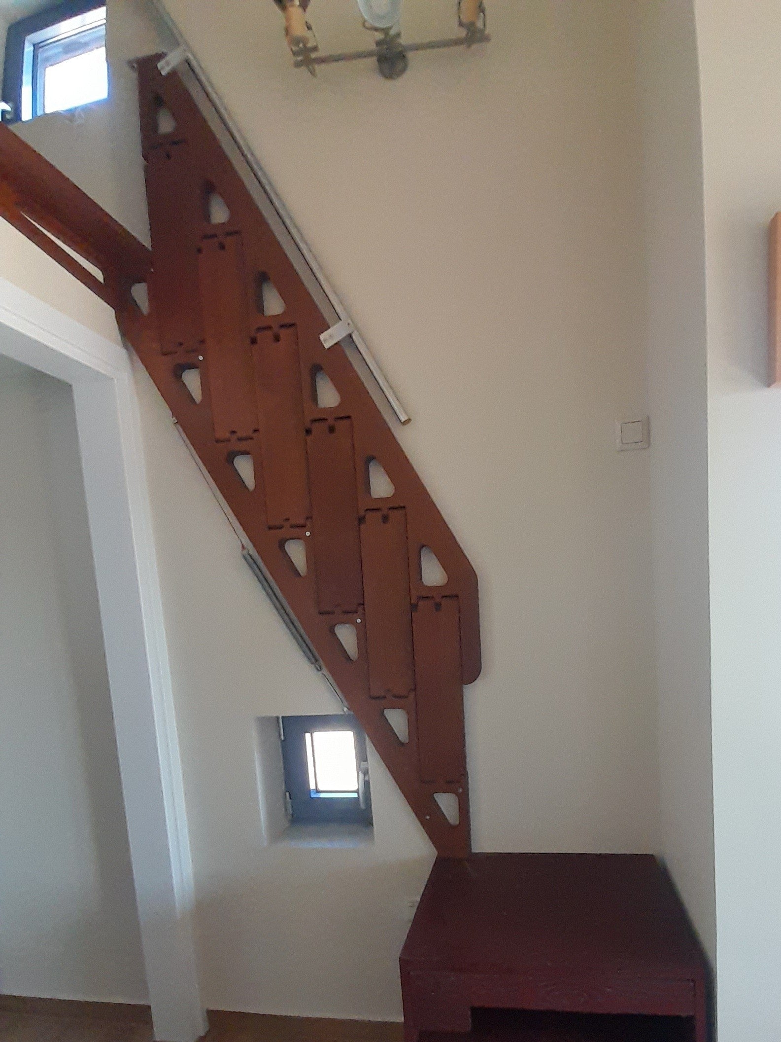 A customised bamboo ladder to access a difficult loft area.